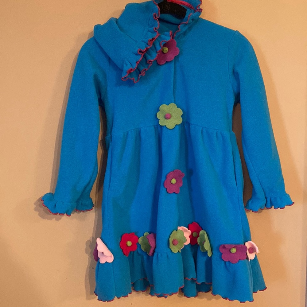 Widgeon jacket with hood.  Floral details with ruffles. Girls size 7